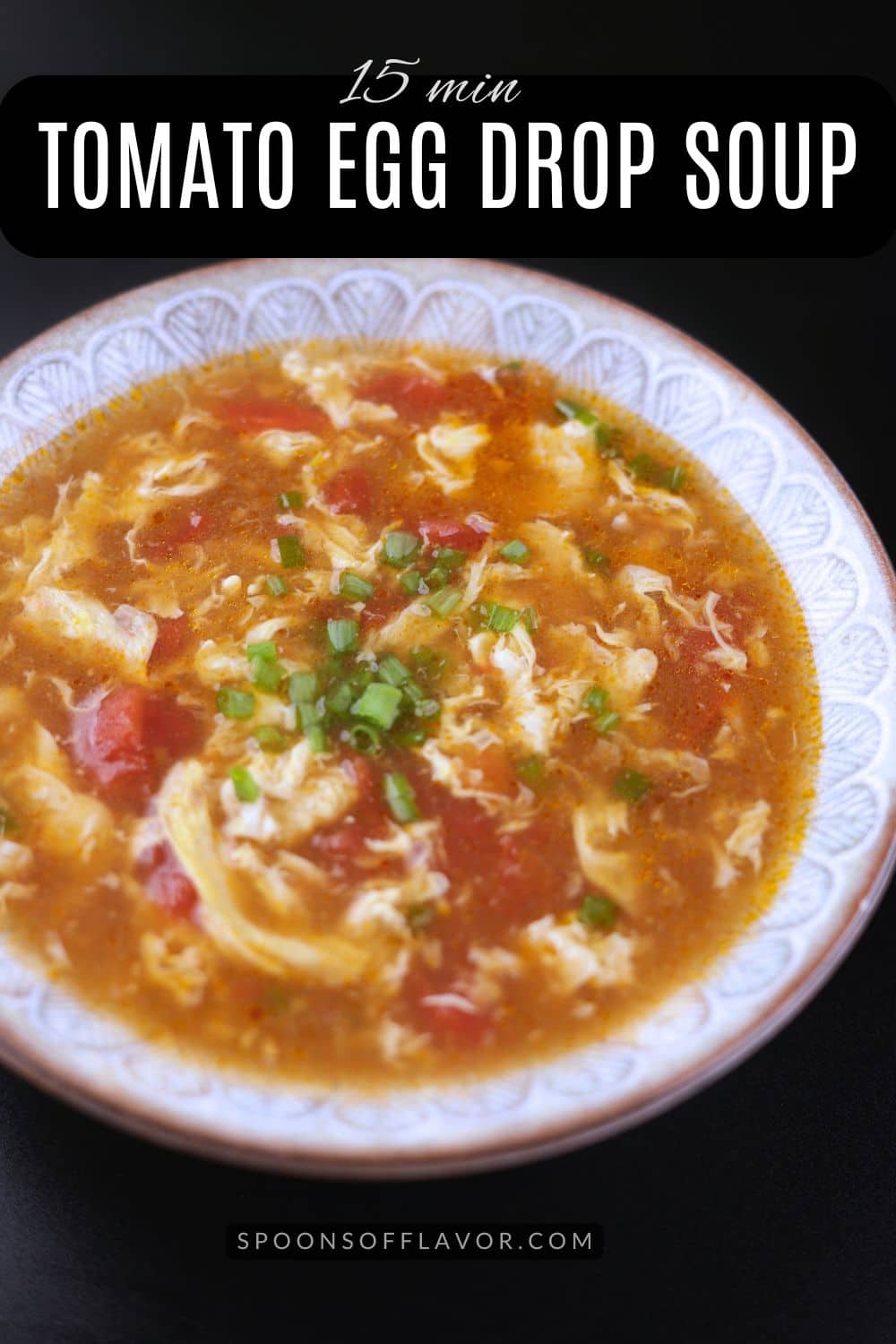 Tomato egg drop soup in a bowl with egg ribbons and green onion garnish – quick, cozy, and full of flavor.