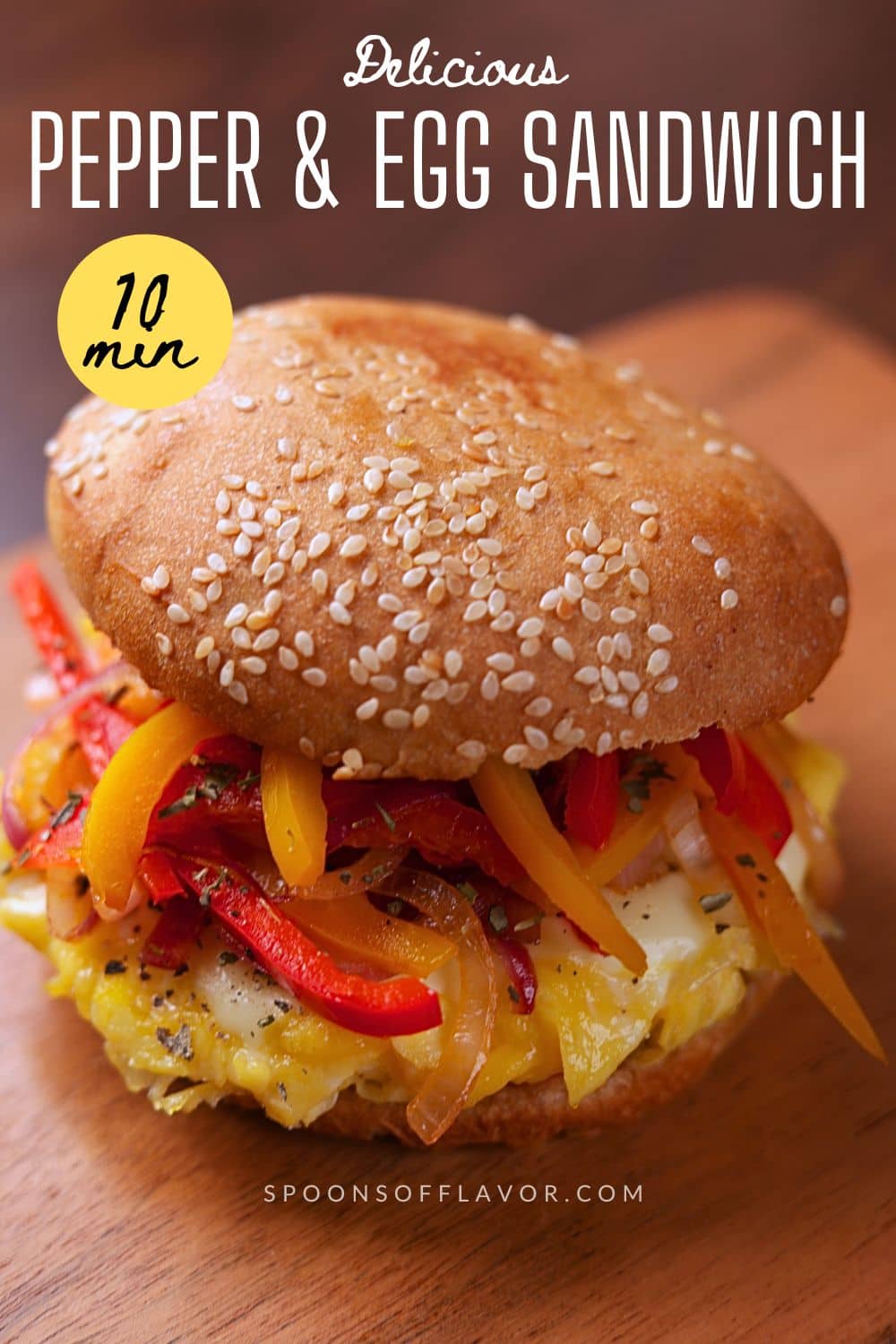 Pepper and Egg Sandwich with soft scrambled eggs, melty cheese, and sautéed peppers and onions on a lightly butter-toasted bun.