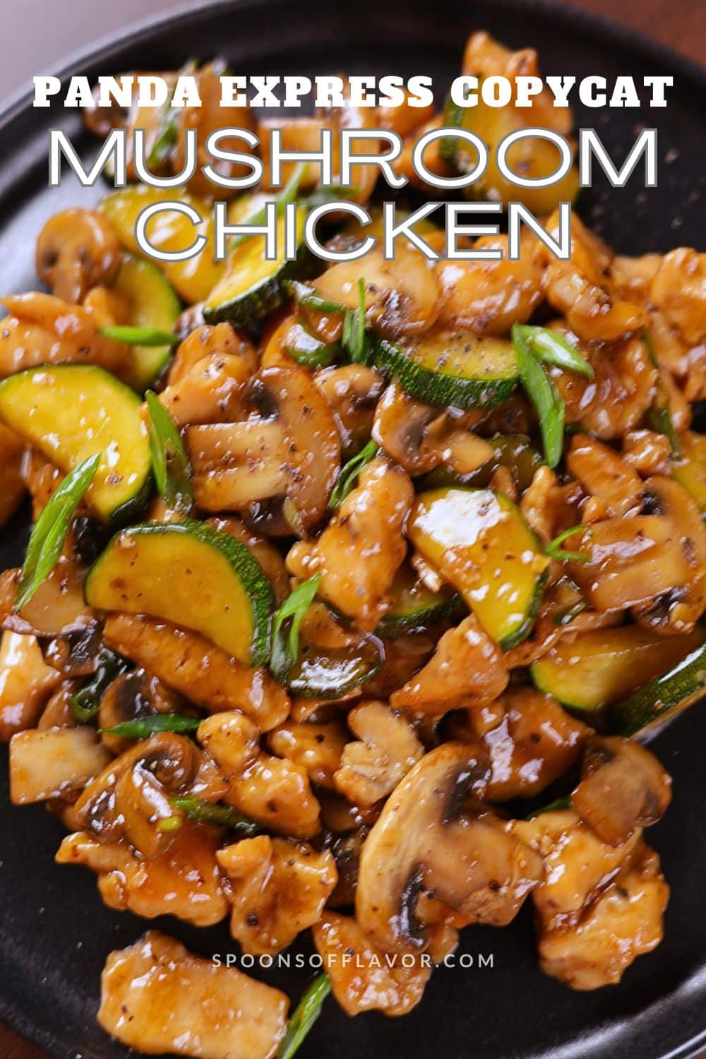 Homemade Panda Express Mushroom Chicken Copycat plated on a black plate.