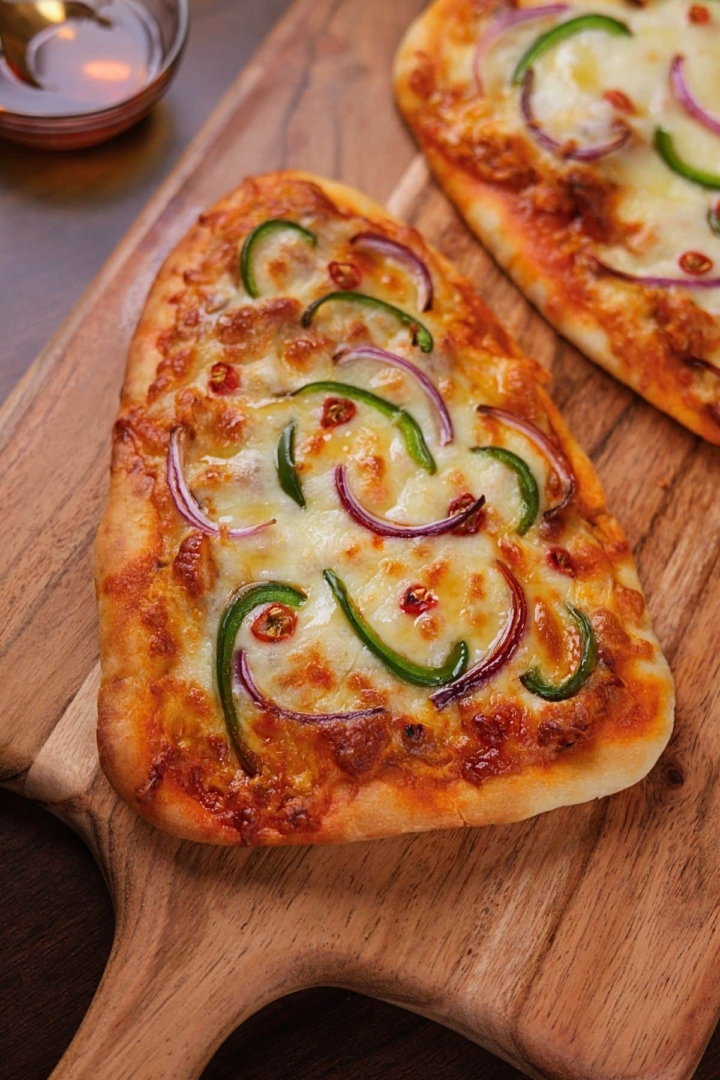 Buffalo chicken naan flatbread pizza fresh out of the oven.