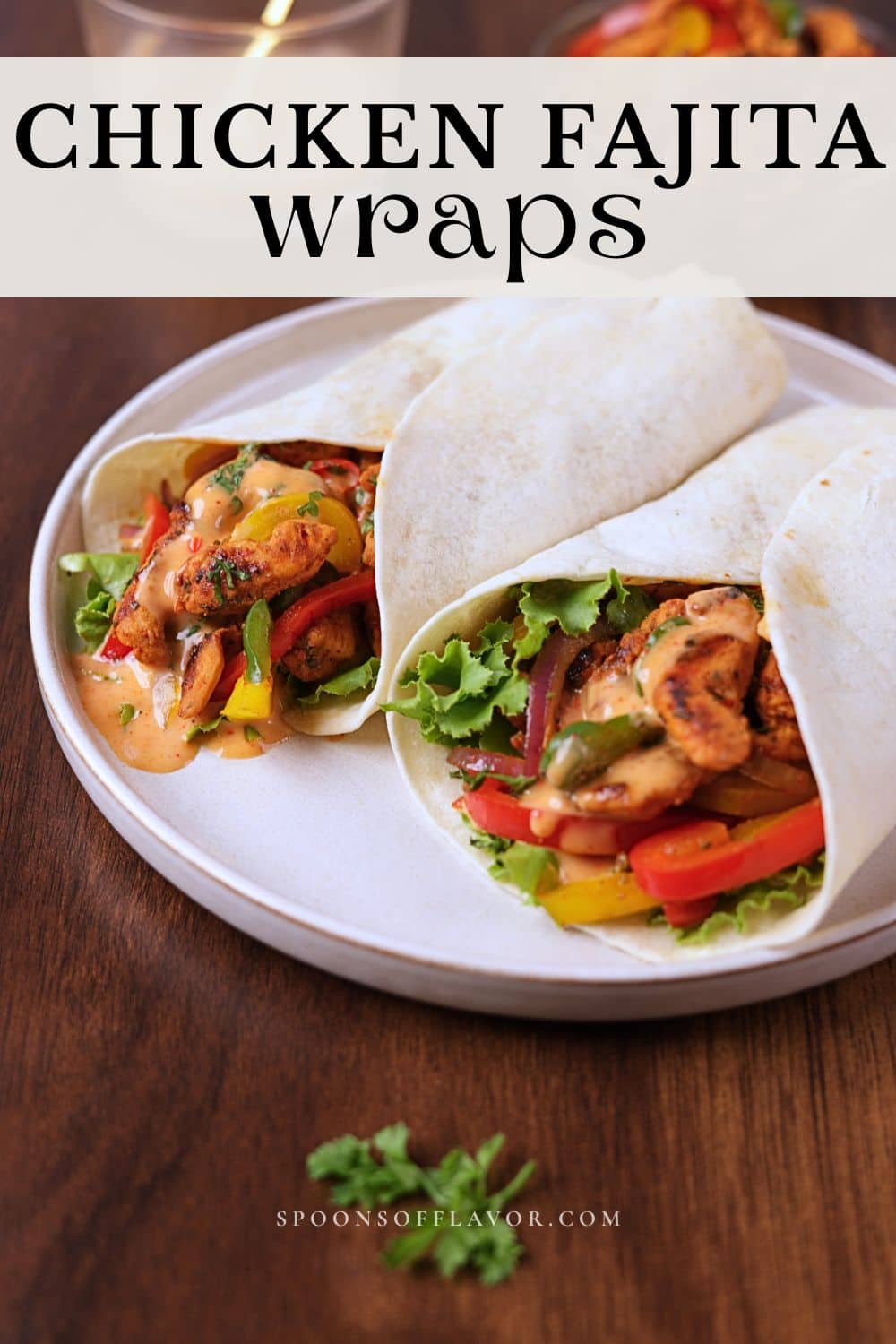Chicken fajita wraps filled with juicy seasoned chicken, sautéed peppers and onions, crisp lettuce, and creamy sauce wrapped in warm tortillas.