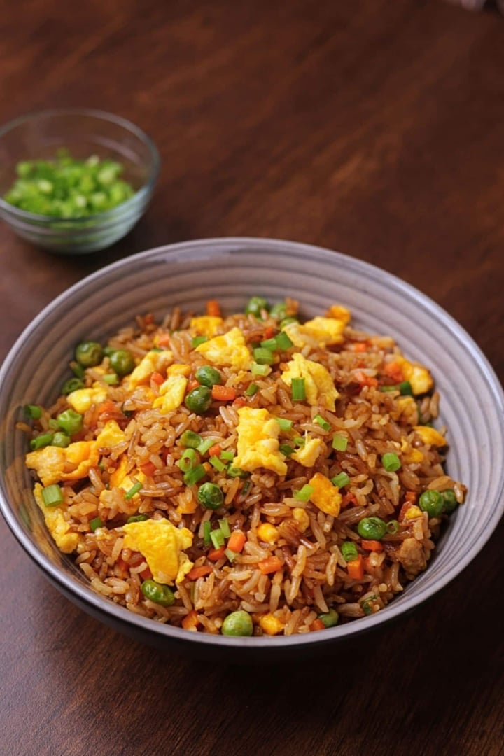 Egg fried rice served in a bowl.