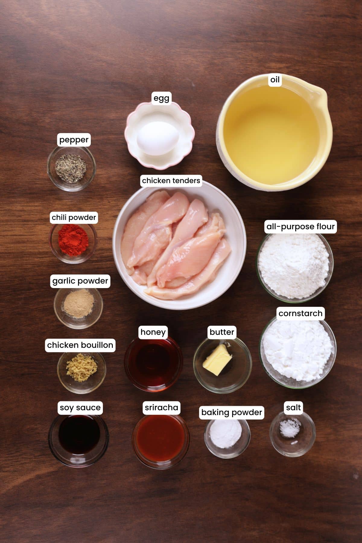 Chicken tenderloins, flour, cornstarch, honey, sriracha, soy sauce, and seasonings for honey sriracha chicken tenders.