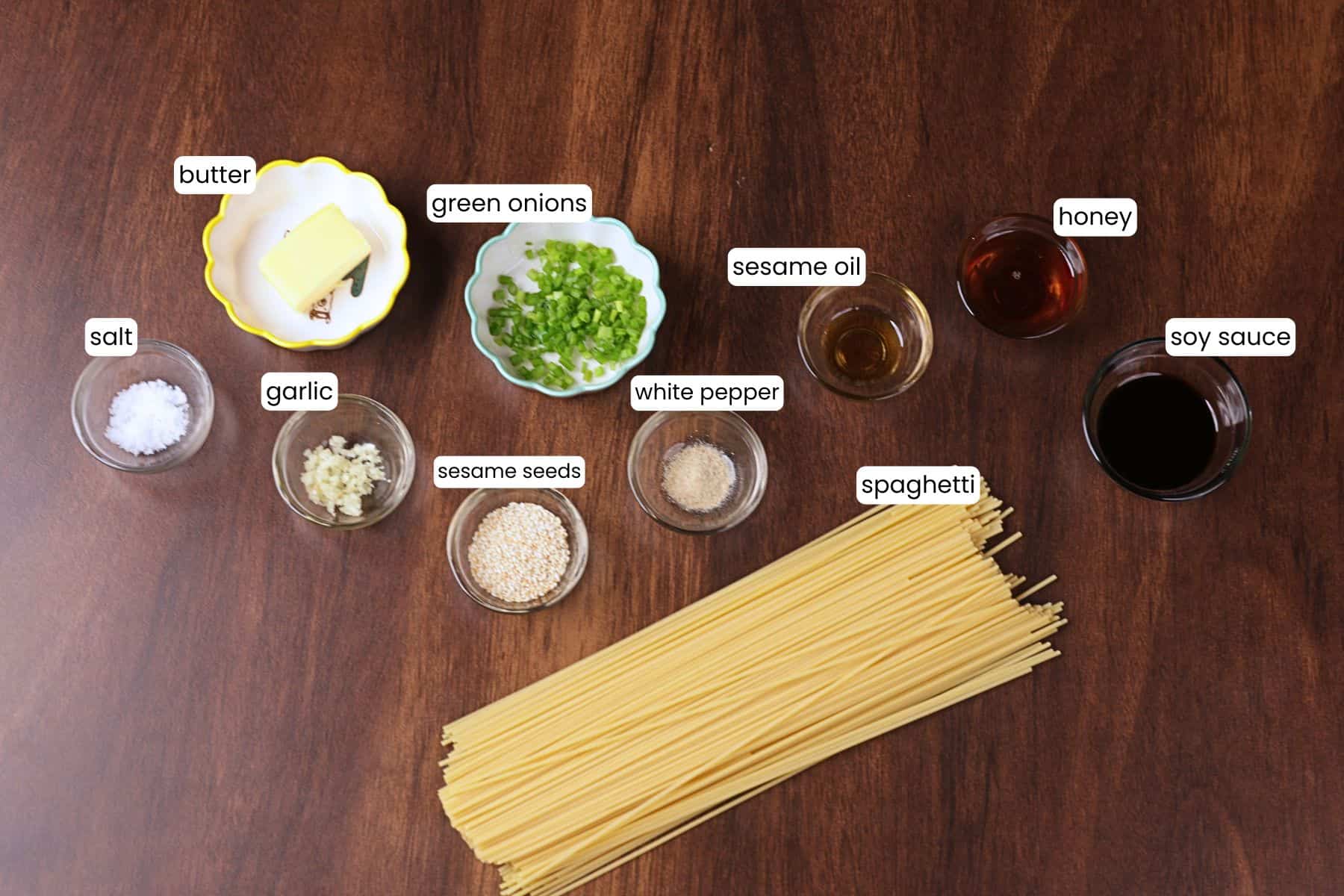 Hibachi noodles ingredients including spaghetti, soy sauce, butter, garlic, honey, and sesame oil.