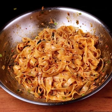 15-minute tuna noodles with canned tuna and creamy sauce in a pan.