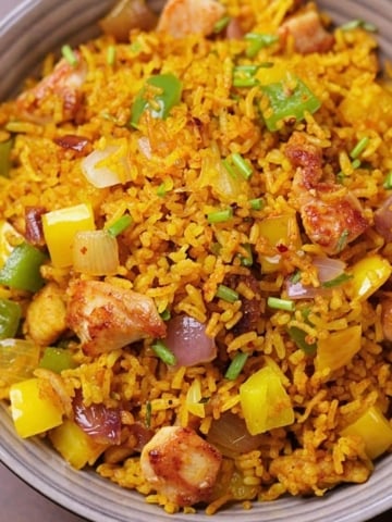 Curry chicken fried rice served in a bowl.